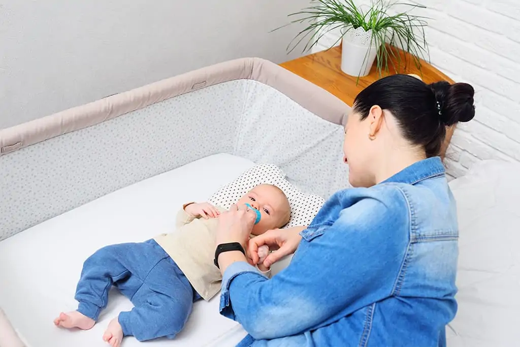 Baby in bassinet